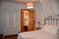 Cama o camas de una habitación en Apartamentos Vista Veleta