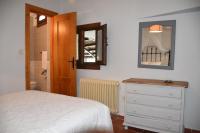 Cama o camas de una habitación en Apartamentos Vista Veleta