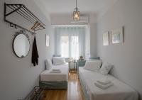 A bed or beds in a room at Attractive Flat near the Acropolis Museum & Metro Station by Athenian Homes