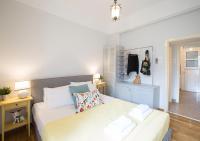 A television and/or entertainment centre at Attractive Flat near the Acropolis Museum & Metro Station by Athenian Homes