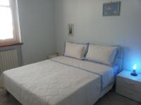 Posteľ alebo postele v izbe v ubytovaní Conte Caramelli Apartment