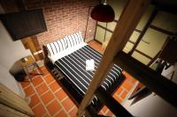 Poste&#x13E; alebo postele v izbe v ubytovan&iacute; Kinba Guest House