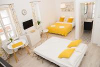 Posteľ alebo postele v izbe v ubytovaní Rába Apartman House