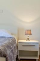 Posteľ alebo postele v izbe v ubytovaní Apartmani Prodan 2