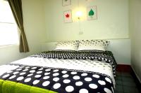 Postel nebo postele na pokoji v ubytování Roo Poo Guest House