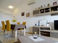 Televízia a/alebo spoločenská miestnosť v ubytovaní Apartment Bellavista