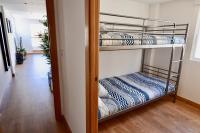 Postel nebo postele na pokoji v ubytování City Center Penthouse by NRAS