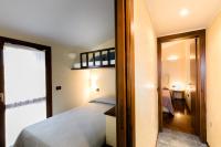 Posteľ alebo postele v izbe v ubytovaní Sirmio Apartments - Primavera Stay