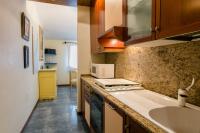 Kuchyňa alebo kuchynka v ubytovaní Sirmio Apartments - Primavera Stay