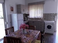 Kuchyň nebo kuchyňský kout v ubytování Petasos Apartments 1