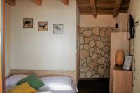 Postel nebo postele na pokoji v ubytování Boutique B&B Agroturizam Sv. Juraj