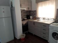 Kuchyň nebo kuchyňský kout v ubytování Petasos Apartments 1