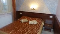 Łóżko lub łóżka w pokoju w obiekcie Hotel Irys