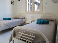 Posteľ alebo postele v izbe v ubytovaní Guest House Adele
