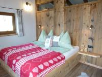 Łóżko lub łóżka w pokoju w obiekcie Sonnberg Apartment
