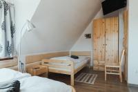 Posteľ alebo postele v izbe v ubytovaní Przy Szlaku Zakopane centrum pokoje & apartamenty