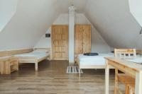 Posteľ alebo postele v izbe v ubytovaní Przy Szlaku Zakopane centrum pokoje & apartamenty