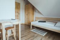 Posteľ alebo postele v izbe v ubytovaní Przy Szlaku Zakopane centrum pokoje & apartamenty