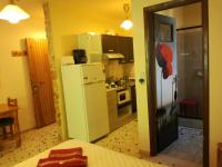 Kuchyňa alebo kuchynka v ubytovaní Apartments Zoumperi