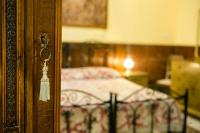 A bed or beds in a room at B&B Santa Caterina