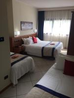 Posteľ alebo postele v izbe v ubytovaní Green Hotel Ninfa