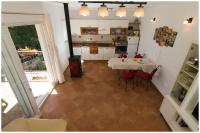 Kuchnia lub aneks kuchenny w obiekcie Apartments FRAGOLINA