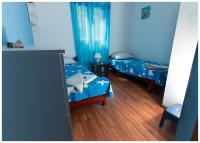 Łóżko lub łóżka w pokoju w obiekcie Apartments FRAGOLINA