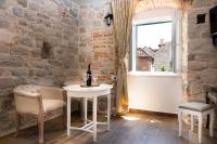 Televízia a/alebo spoločenská miestnosť v ubytovaní Studio Amore in Diocletian palace