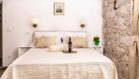 Posteľ alebo postele v izbe v ubytovaní Studio Amore in Diocletian palace