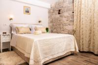 Posteľ alebo postele v izbe v ubytovaní Studio Amore in Diocletian palace