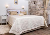 Posteľ alebo postele v izbe v ubytovaní Studio Amore in Diocletian palace