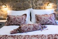 Posteľ alebo postele v izbe v ubytovaní Studio Amore in Diocletian palace
