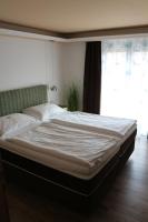 Posteľ alebo postele v izbe v ubytovaní Pension Wachau