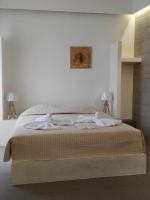 Posteľ alebo postele v izbe v ubytovaní Christina Boutique Studios Elounda