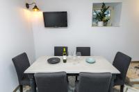 Televízia a/alebo spoločenská miestnosť v ubytovaní House "Vesela"