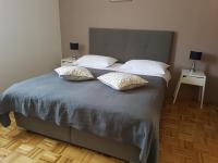 Posteľ alebo postele v izbe v ubytovaní Apartments & Rooms Formenti