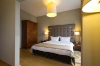 Ein Bett oder Betten in einem Zimmer der Unterkunft Don Prestige Residence