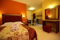 Postel nebo postele na pokoji v ubytování Faros Luxury Suites
