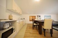 Kuchyňa alebo kuchynka v ubytovaní Apartment Mareta