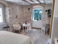 Posteľ alebo postele v izbe v ubytovaní Studio Amore in Diocletian palace