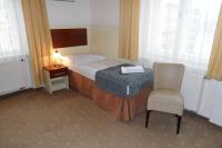 Postel nebo postele na pokoji v ubytování Hotel Atos