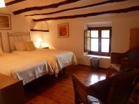 Postel nebo postele na pokoji v ubytování Hotel Casa Pedro Barrera
