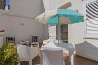 Patio alebo iná vonkajšia časť ubytovania Il Sogno Apartments