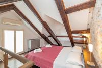 Posteľ alebo postele v izbe v ubytovaní Apartment Bona Palace