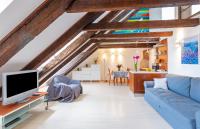 Televízia a/alebo spoločenská miestnosť v ubytovaní Apartment Bona Palace