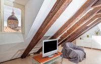 Televízia a/alebo spoločenská miestnosť v ubytovaní Apartment Bona Palace