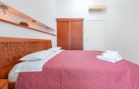 Posteľ alebo postele v izbe v ubytovaní Apartment Bona Palace