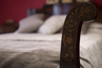 A bed or beds in a room at La Caseta del Priorat