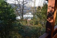 a view of a river from a window of a house at Chalet Vintage in Pollieu