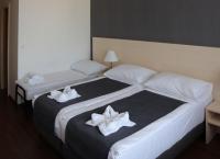 Łóżko lub łóżka w pokoju w obiekcie Hotel Krystal